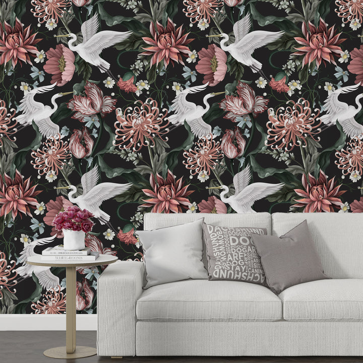 Elegant Chinoiserie-style wallpaper featuring white cranes, blooming florals, and a dark background