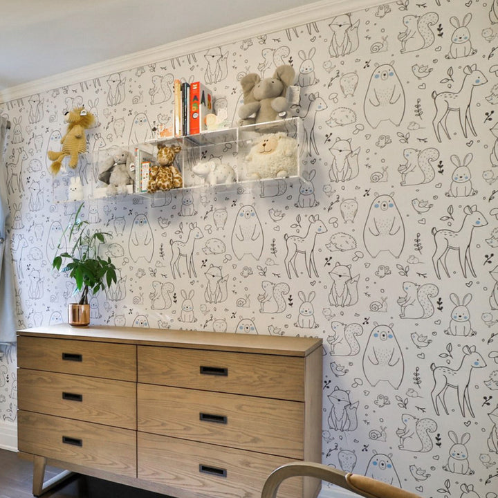 Neutral animal nursery wallpaper showcasing hedgehogs, deer, foxes, owls, and bunnies, hand-illustrated with soft color touches, removable and safe for walls, available in peel-and-stick or pre-pasted material.