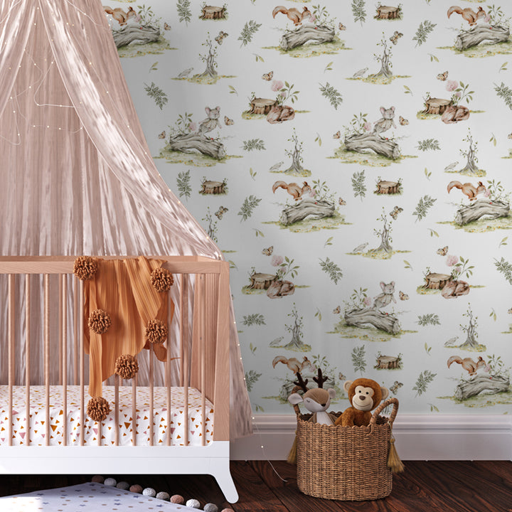 Neutral forest animal wallpaper with vintage sketch-style deer, mice, butterflies, and tree stumps on a light background, printed on removable peel and stick panels.