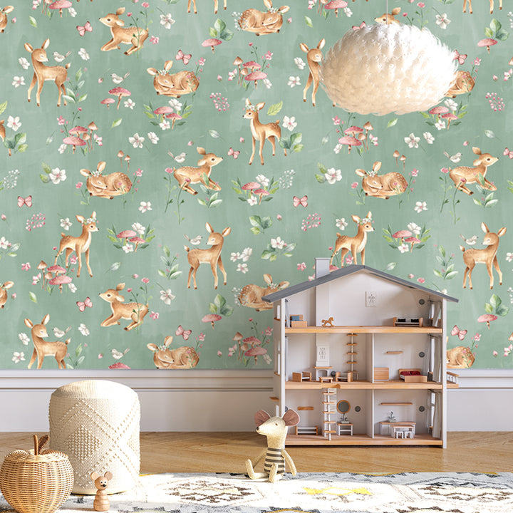 Watercolor deer wallpaper featuring baby fawns, wildflowers, butterflies, and mushrooms on a soft sage green background, available in removable peel and stick or pre-pasted.