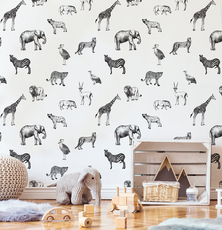 Safari animal wallpaper in monochrome tones with elegant hand-sketched elephants, giraffes, leopards, and zebras, perfect for gender-neutral nurseries and contemporary décor styles.