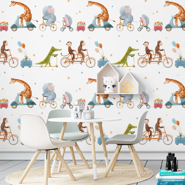 Whimsical nursery wallpaper featuring watercolor animals riding bikes and scooters, including giraffes, elephants, monkeys, and crocodiles, perfect for kids’ rooms.