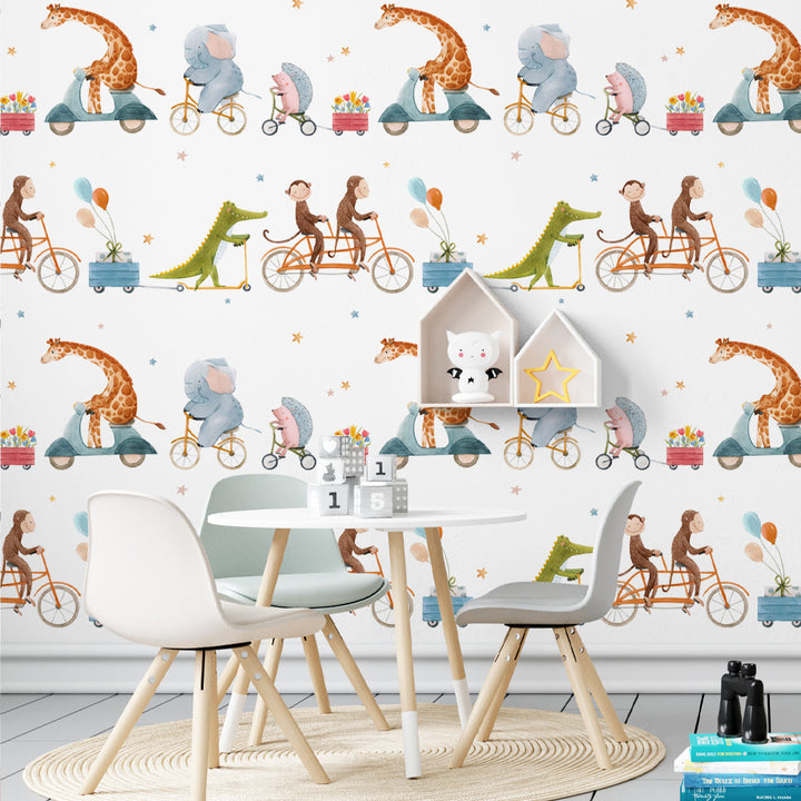 Whimsical nursery wallpaper featuring watercolor animals riding bikes and scooters, including giraffes, elephants, monkeys, and crocodiles, perfect for kids’ rooms.