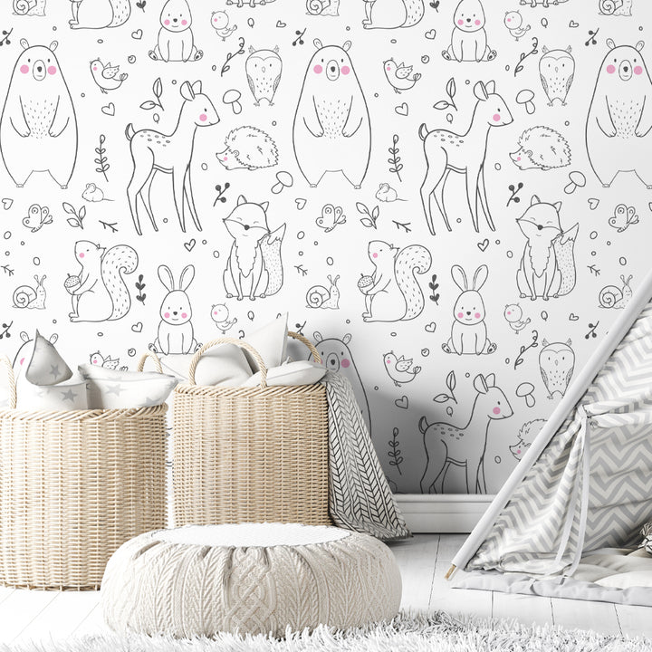 Minimalist forest animal wallpaper pattern with hand-sketched woodland creatures and soft pink details, printed on eco-friendly material for nurseries, playrooms, or kids’ bedrooms.