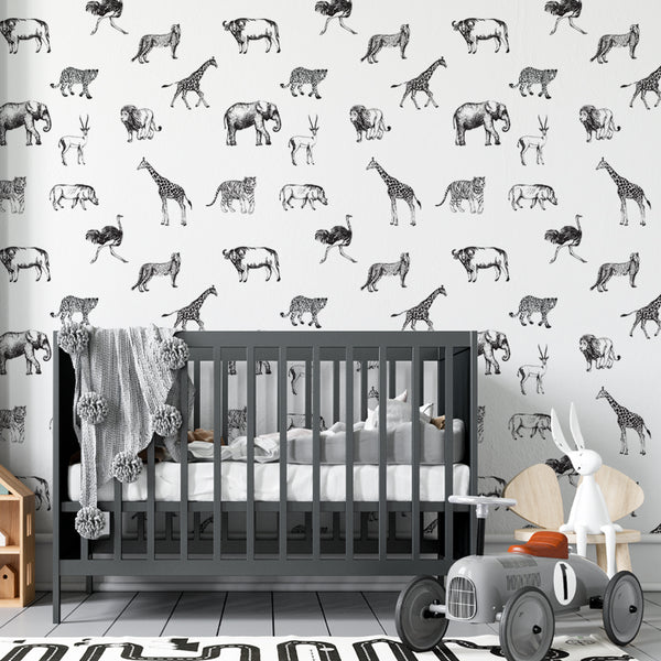 Black and white safari animal wallpaper featuring elephants, lions, giraffes, and zebras, perfect for nurseries or playrooms, removable and eco-friendly with peel-and-stick or pre-pasted options.