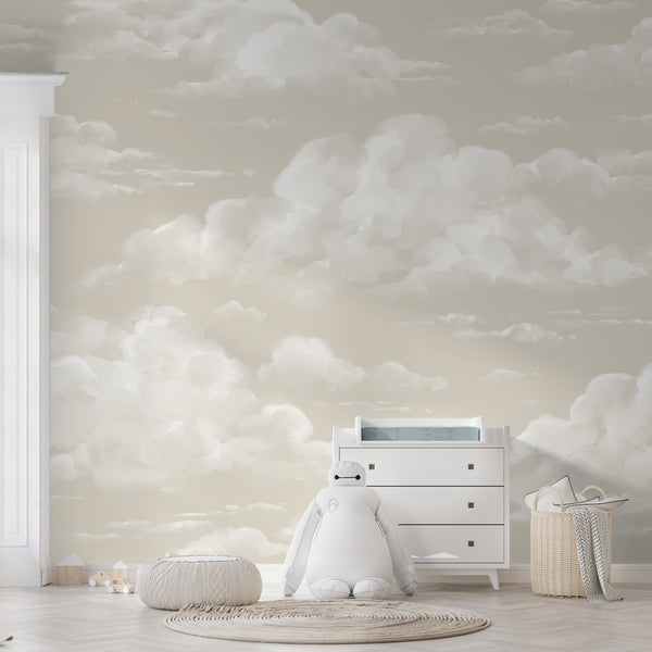 Neutral beige cloud wallpaper mural featuring soft painted clouds on a warm background, available in removable peel and stick or pre-pasted material for easy installation.
