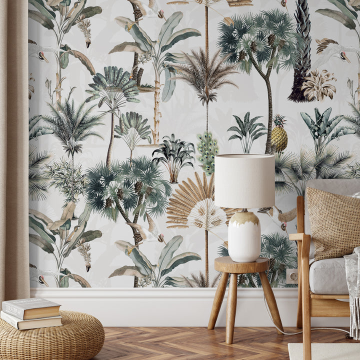 Elegant tropical wallpaper featuring lush palm trees, exotic birds, and golden fan motifs on a light background.