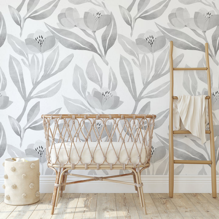 Elegant grey floral wall covering with watercolor blooms and leaves, ideal for creating a serene bedroom accent wall or a soft neutral nursery backdrop.