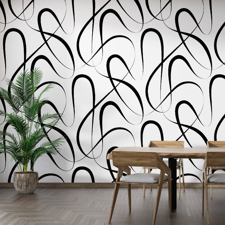 Minimalist black abstract line art on a white backdrop, creating a striking and elegant wallpaper design for stylish interiors. Abstract wallpaper, Modern peel and stick wallpaper, Black and white loops, Contemporary wallpaper design, Curvy wallpaper pattern, Minimalist wallpaper style, Stylish removable wallpaper, Abstract black wallpaper, Looping wallpaper design, Trendy wall decor