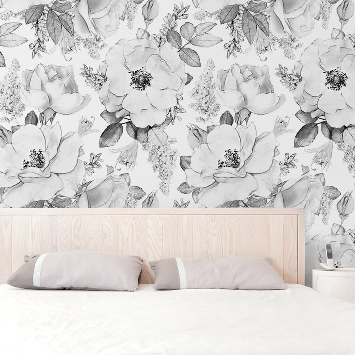 Neutral oversized floral wallpaper with charcoal line art flowers and leafy details, printed on removable peel and stick or pre-pasted wallpaper for stylish bedrooms and living spaces.