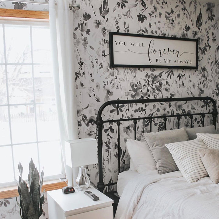 Elegant neutral wildflower wallpaper featuring hand-painted florals and foliage, ideal for creating gentle, gender-neutral nursery walls or soft botanical feature walls.