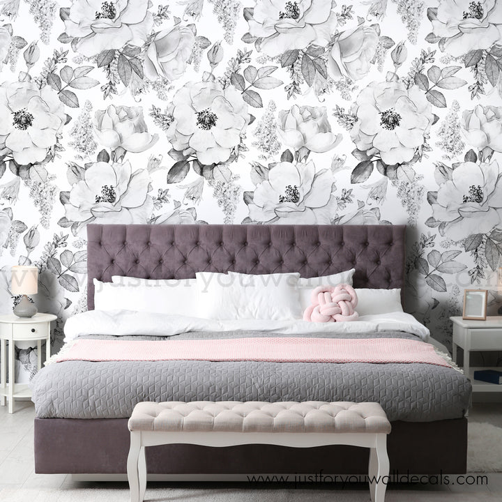 Large-scale black and white peony wallpaper with sketch-style line drawings, designed for removable installation using peel and stick or pre-pasted panels suitable for renters and homeowners.
