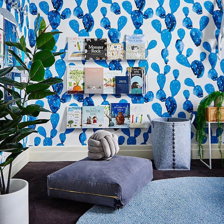 Blue watercolor cactus wallpaper featuring hand-painted desert pads in rich indigo and cobalt tones, perfect for a playful boys’ bedroom or nursery. Available in peel and stick or pre-pasted materials that are removable and eco-friendly.