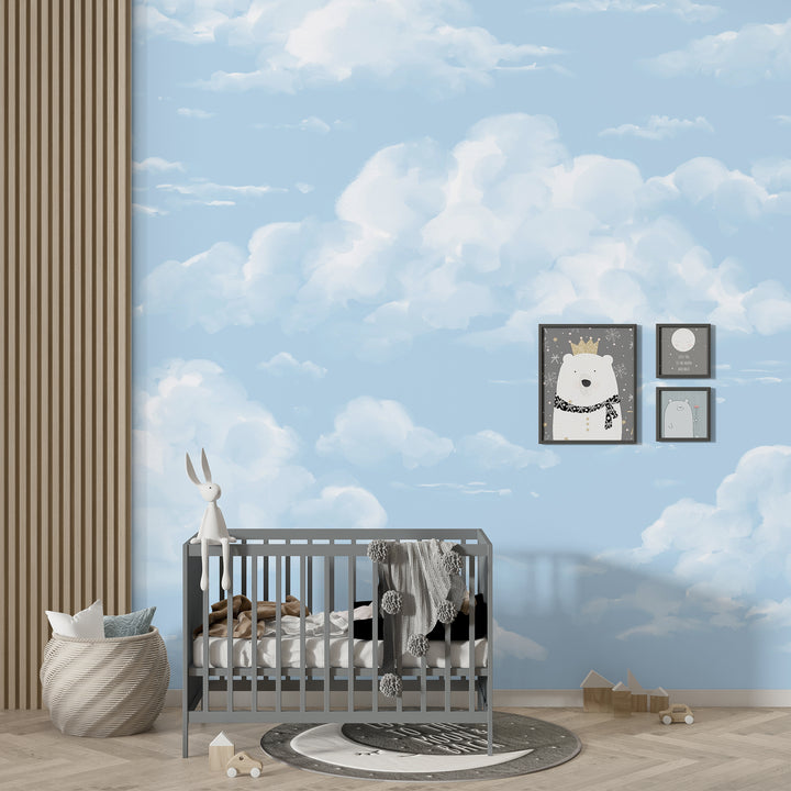 Dreamy sky wallpaper featuring fluffy white clouds on a serene blue background, available in removable peel and stick or pre-pasted formats for simple installation.