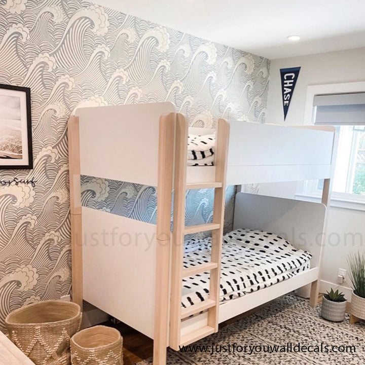 Contemporary wallpaper featuring repeating ocean wave patterns in soothing blue and white