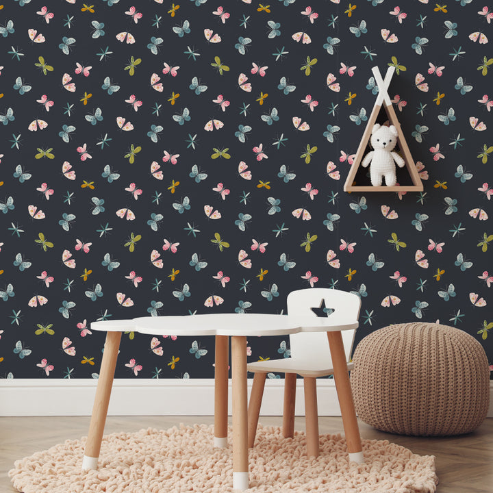 Whimsical butterfly and dragonfly wallpaper in soft watercolor shades set against dark navy, ideal for modern nurseries, playrooms, or nature-themed kids’ decor.