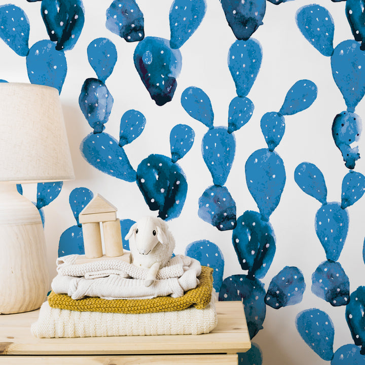 Watercolor cactus wallpaper in cool blue tones adds a fun and creative touch to any child’s room or baby nursery. Printed on eco-friendly peel-and-stick or pre-pasted wallpaper, removable without damage, and featuring a smooth semi-matte finish.