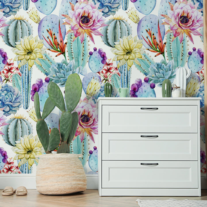 Desert floral watercolor wallpaper with soft cacti, succulents, and blossoms in pink, lilac, blue, and yellow tones. Perfect for nurseries, laundry rooms, or feature walls. Removable and eco-friendly in peel-and-stick or pre-pasted options