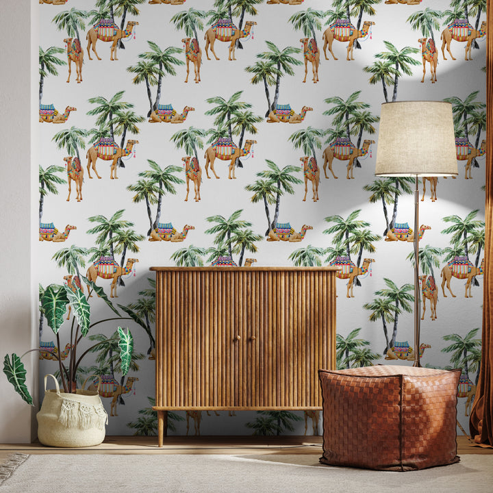 Watercolor camel and palm tree wallpaper design featuring colorful camels with patterned saddles under tropical palms, ideal for boho nurseries or kids’ bedrooms.