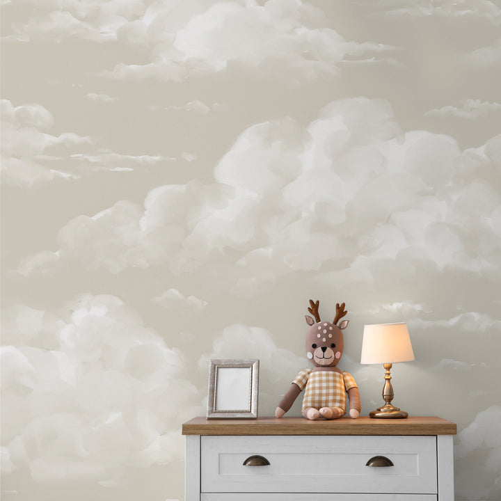 Painterly cloud wallpaper featuring soft beige sky tones, offered in removable peel and stick or pre-pasted wallpaper for easy DIY installation.