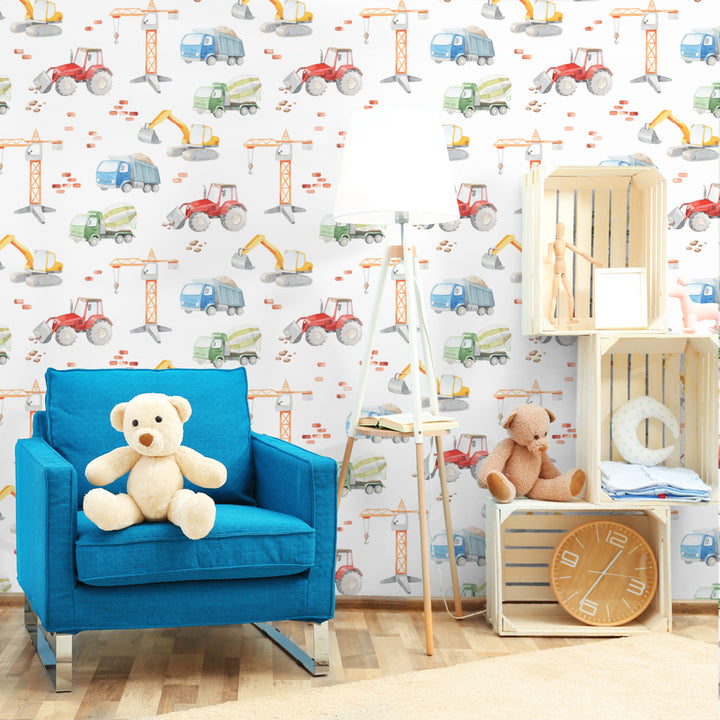 Vehicle themed kids wallpaper featuring cranes, dump trucks, diggers and bricks on a white background, printed on peel and stick or pre-pasted removable wallpaper panels.