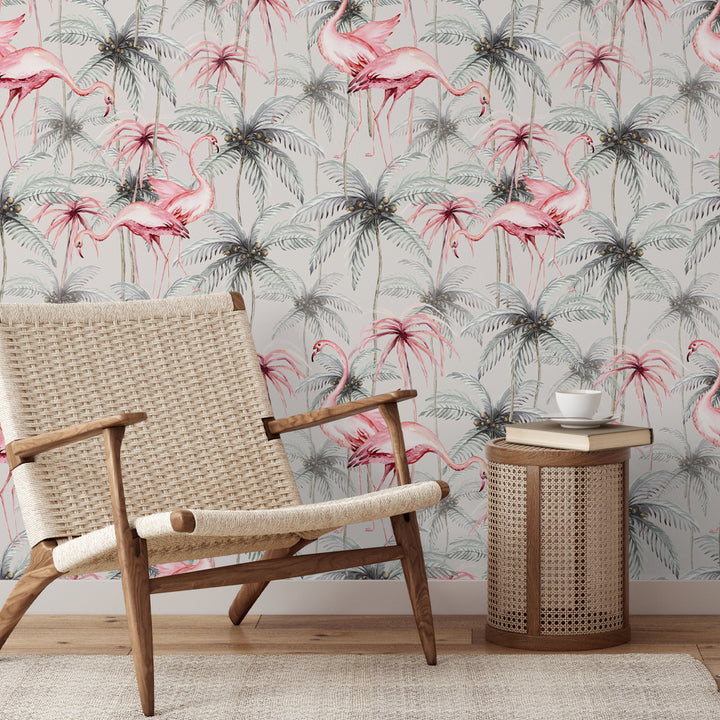 Tropical flamingo wallpaper featuring pink flamingos and palm trees on a soft grey background, available in peel and stick or pre-pasted removable options.
