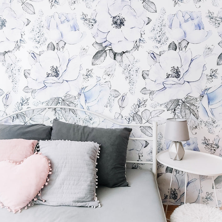 Monochrome botanical floral wallpaper featuring large charcoal grey flowers on a white background, printed on peel and stick or pre-pasted removable wallpaper ideal for bedrooms and nursery decor.