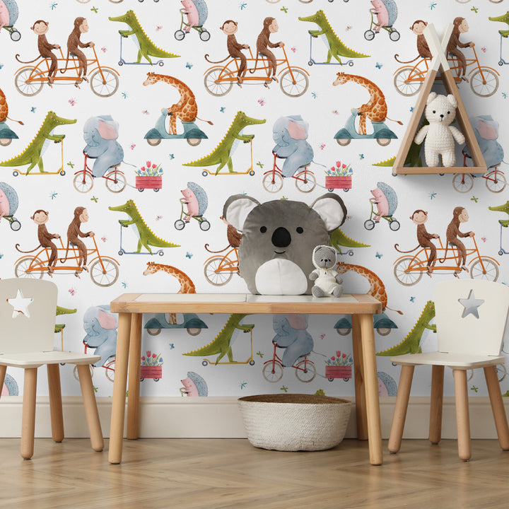 Watercolor wallpaper featuring animals on bicycles, scooters, and wagons, including monkeys, elephants, giraffes, and dinosaurs, removable and eco-friendly for kids’ room décor.