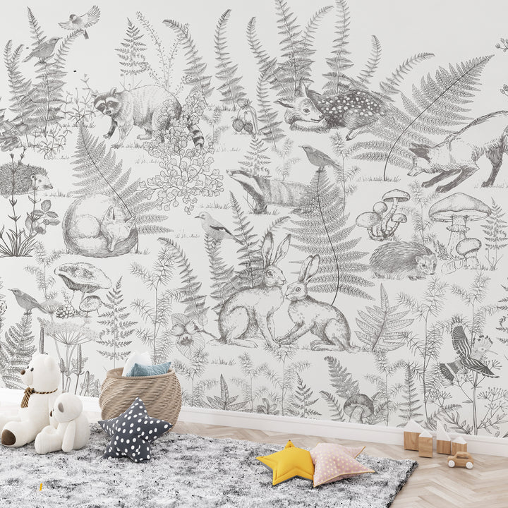 Pre-pasted removable forest mural featuring deer, fox, raccoon, and birds in fine line art.