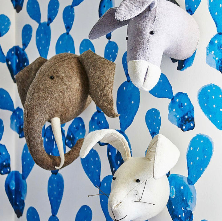 Watercolor cactus peel-and-stick wallpaper in blue hues, combining artistic texture with easy DIY installation. This removable wallpaper suits nurseries, playrooms, or desert-themed interiors and is made with eco-friendly, premium materials.