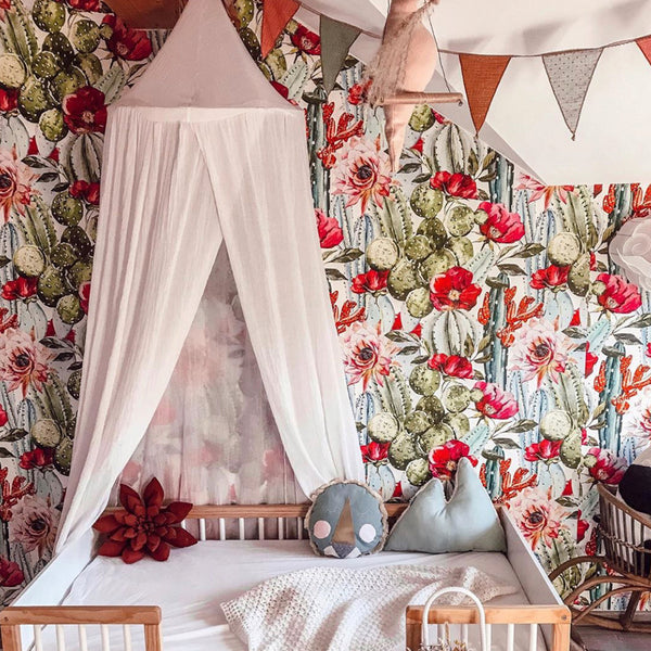 Vibrant watercolor cactus wallpaper with pink and coral desert flowers, removable peel-and-stick or pre-pasted, perfect for nursery or boho room décor.