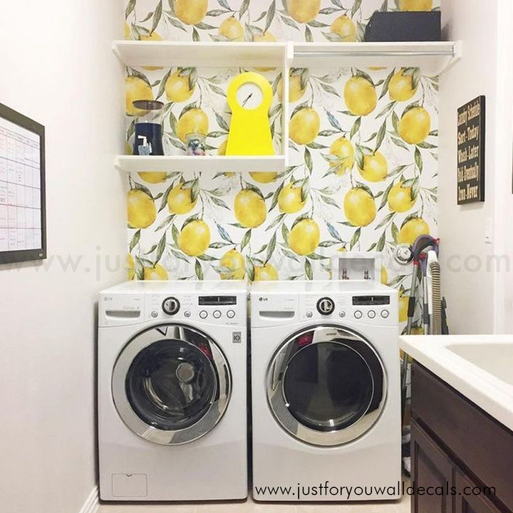 Watercolor lemon wallpaper design featuring bright yellow lemons and green leaves on a white background.