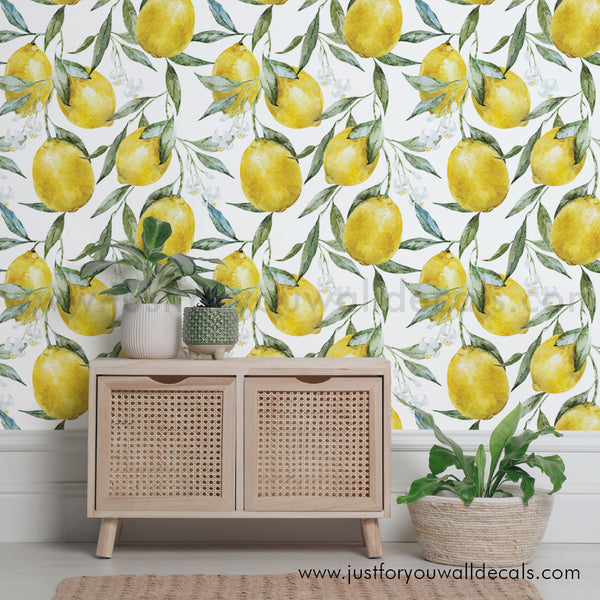 Watercolor lemon wallpaper design featuring bright yellow lemons and green leaves on a white background.