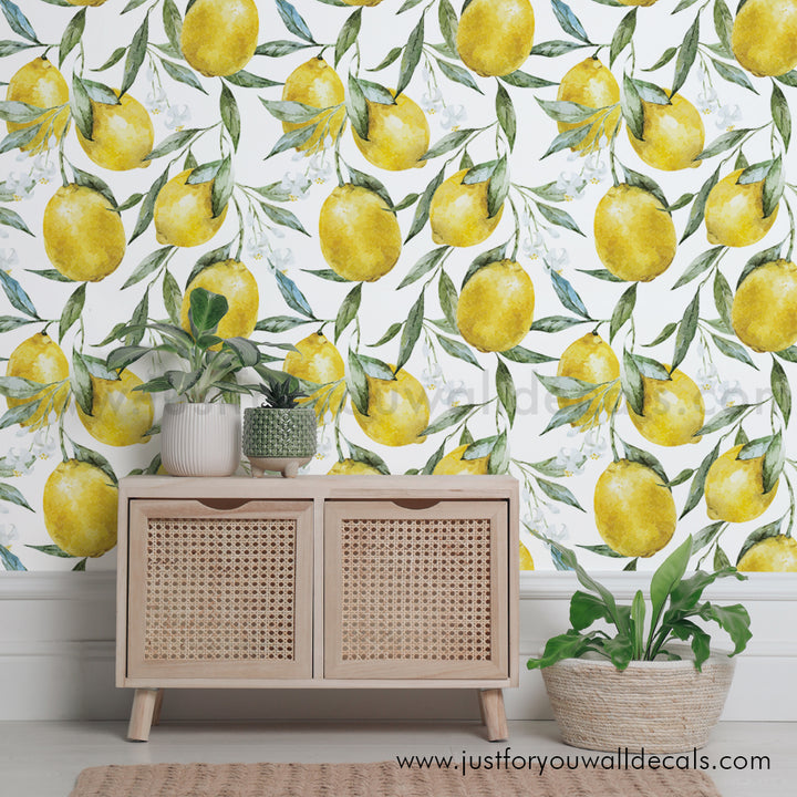 Watercolor lemon wallpaper design featuring bright yellow lemons and green leaves on a white background.