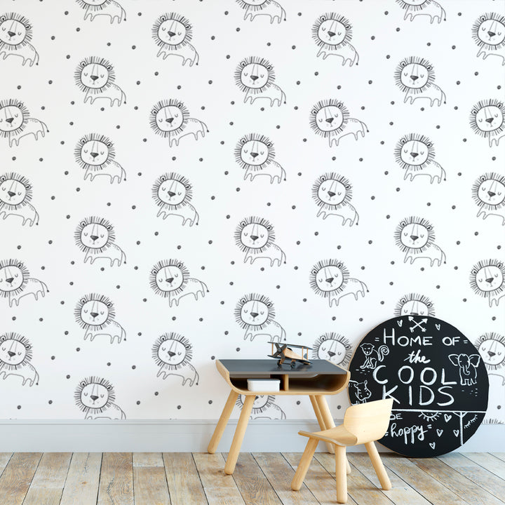 Cute lion wallpaper with doodle-style sleepy lion illustrations and dotted print in a neutral black and white palette, ideal for nurseries, playrooms, and kids bedrooms.