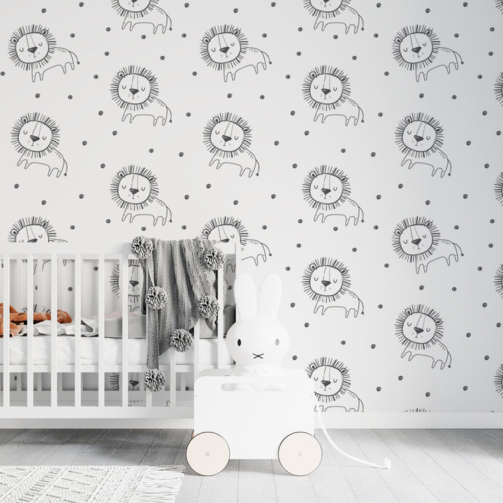 Gender-neutral safari wallpaper with illustrated lions and scattered dots in monochrome tones, offered in peel-and-stick or pre-pasted removable options.