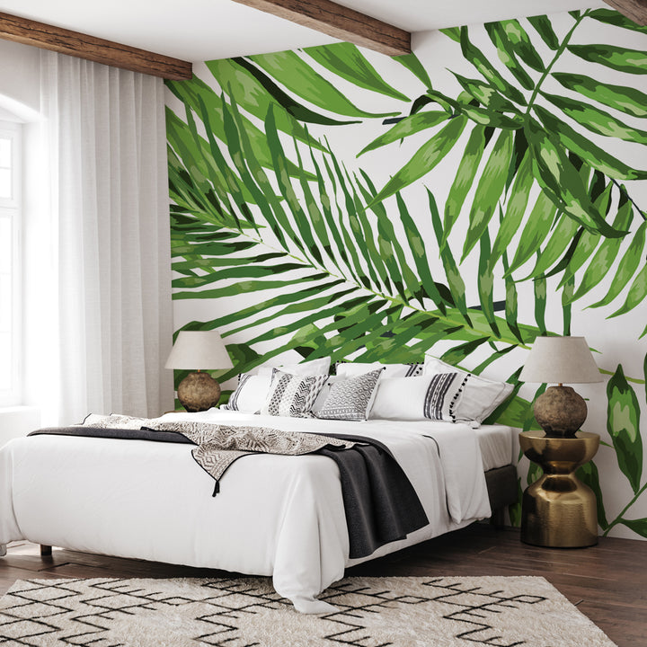 Tropical wallpaper mural with bold palm leaves in vivid green shades, available as peel and stick or pre-pasted, removable and easy to install.