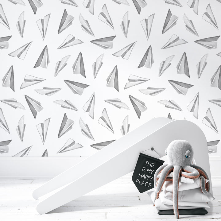 Neutral airplane wallpaper design featuring simple hand-drawn paper planes floating across white background, perfect for nurseries, bedrooms, or playrooms.