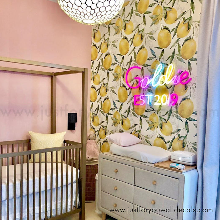 Elegant lemon-themed wallpaper with lush green foliage and ripe yellow lemons painted in soft watercolor strokes.
