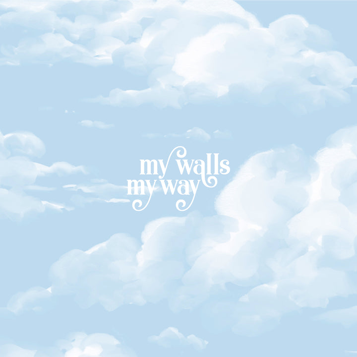 Kids room wallpaper design of watercolor clouds floating across a blue sky, printed on removable peel and stick or pre-pasted wall material for renter-safe installation.