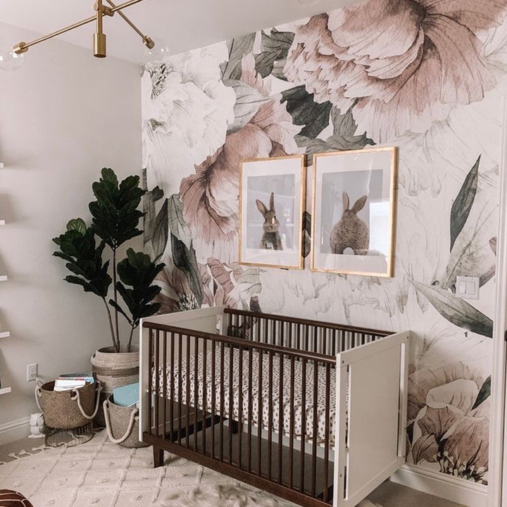 Oversized cottage-style peony wallpaper with soft blush watercolor flowers and leaves, removable peel and stick or pre-pasted installation, suitable for nurseries, bedrooms, and elegant accent walls.