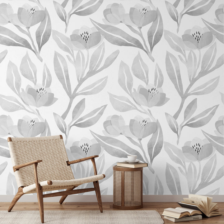 Grayscale botanical wallpaper featuring large watercolor flowers and foliage, printed on peel and stick or pre-pasted removable wallpaper for easy installation.