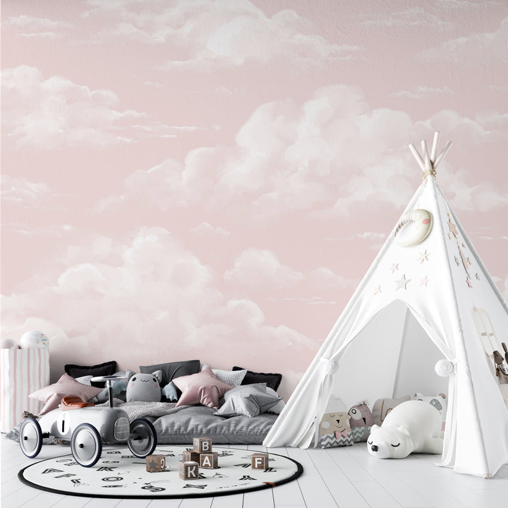 Serene pink sky wallpaper with watercolor-style clouds, removable with no wall damage; offered in peel and stick or pre-pasted options.