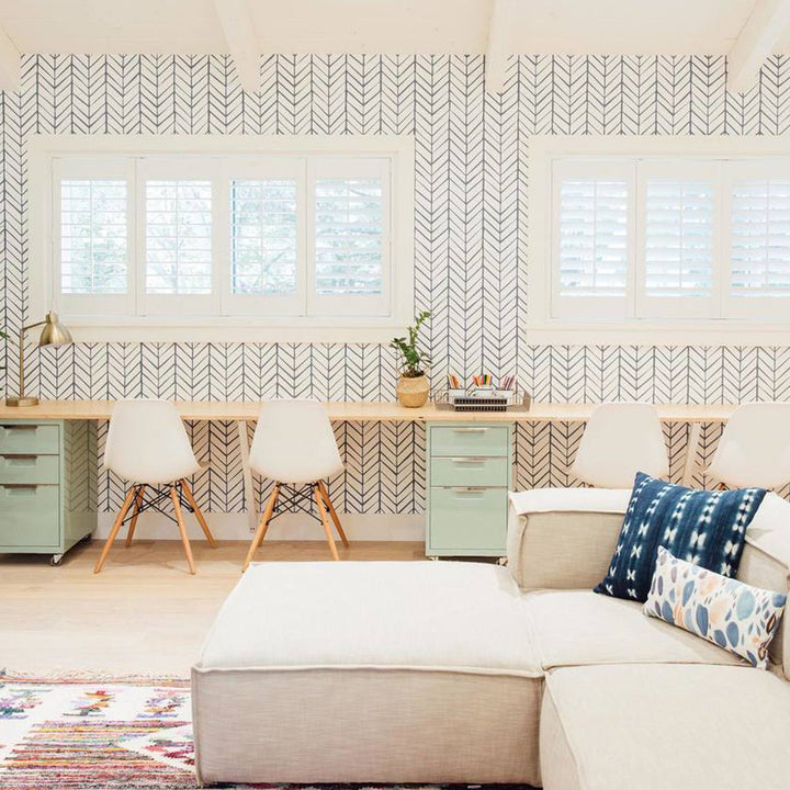 Elegant minimalist wallpaper featuring classic vertical herringbone lines in a neutral monochrome color palette.