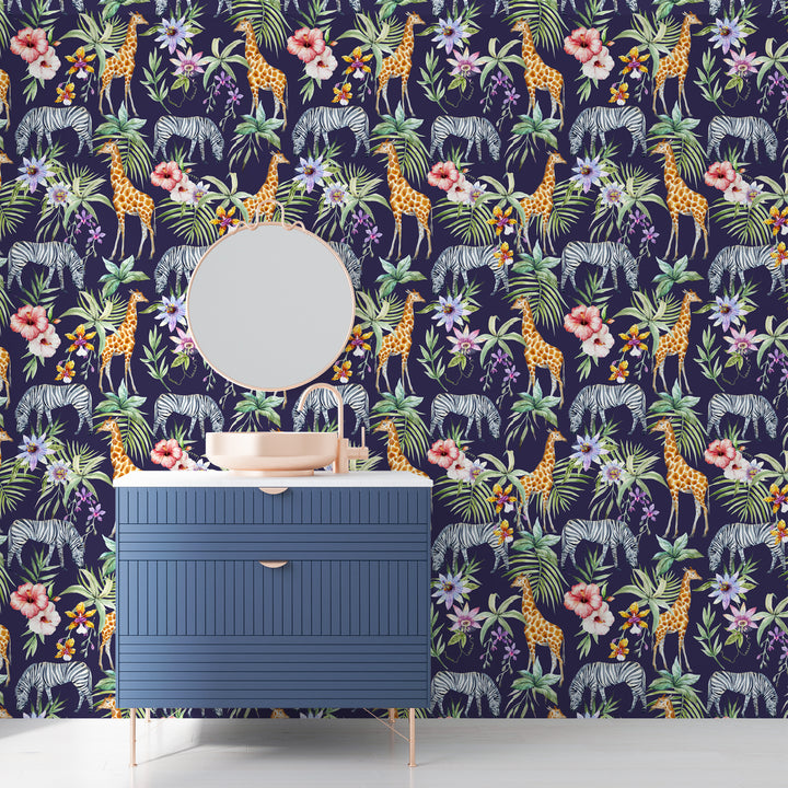 Dark navy tropical wallpaper featuring animals like giraffes and zebras among palm fronds and hibiscus blooms, ideal for bathroom or nursery décor, removable without damage.