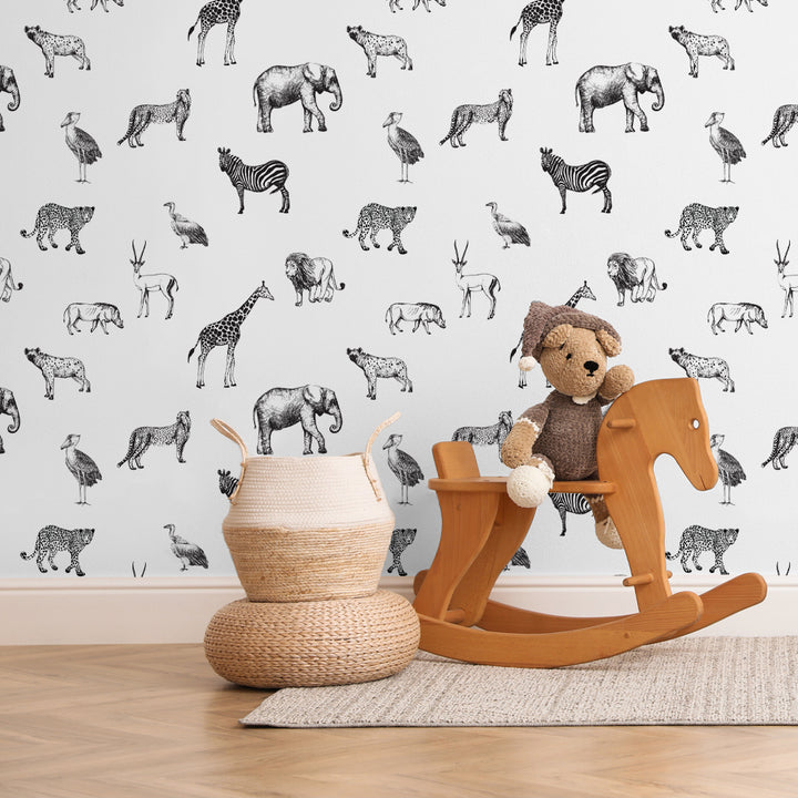 African wildlife wallpaper in neutral tones featuring artistic line drawings of lions, zebras, giraffes, and elephants, perfect for sophisticated nursery or children’s room décor.