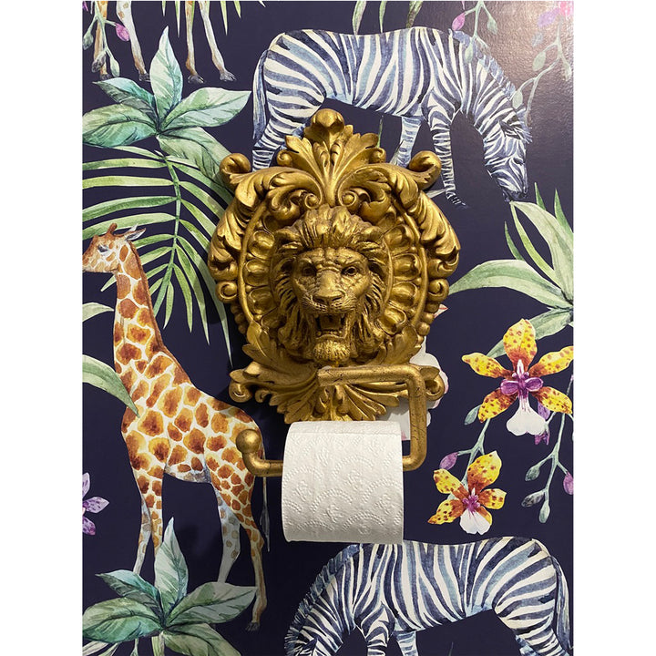 Removable tropical wallpaper showing safari animals and palm leaves in colorful detail on deep navy, easy to apply and ideal for nursery, bathroom, or accent walls.