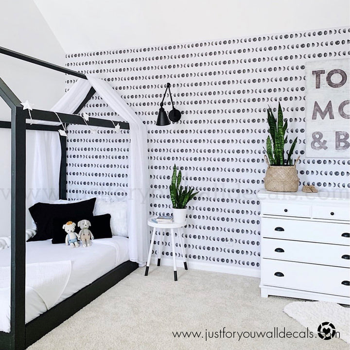 black and white wallpaper, Elegant wallpaper design featuring a repeating moon-phase pattern in black and white 